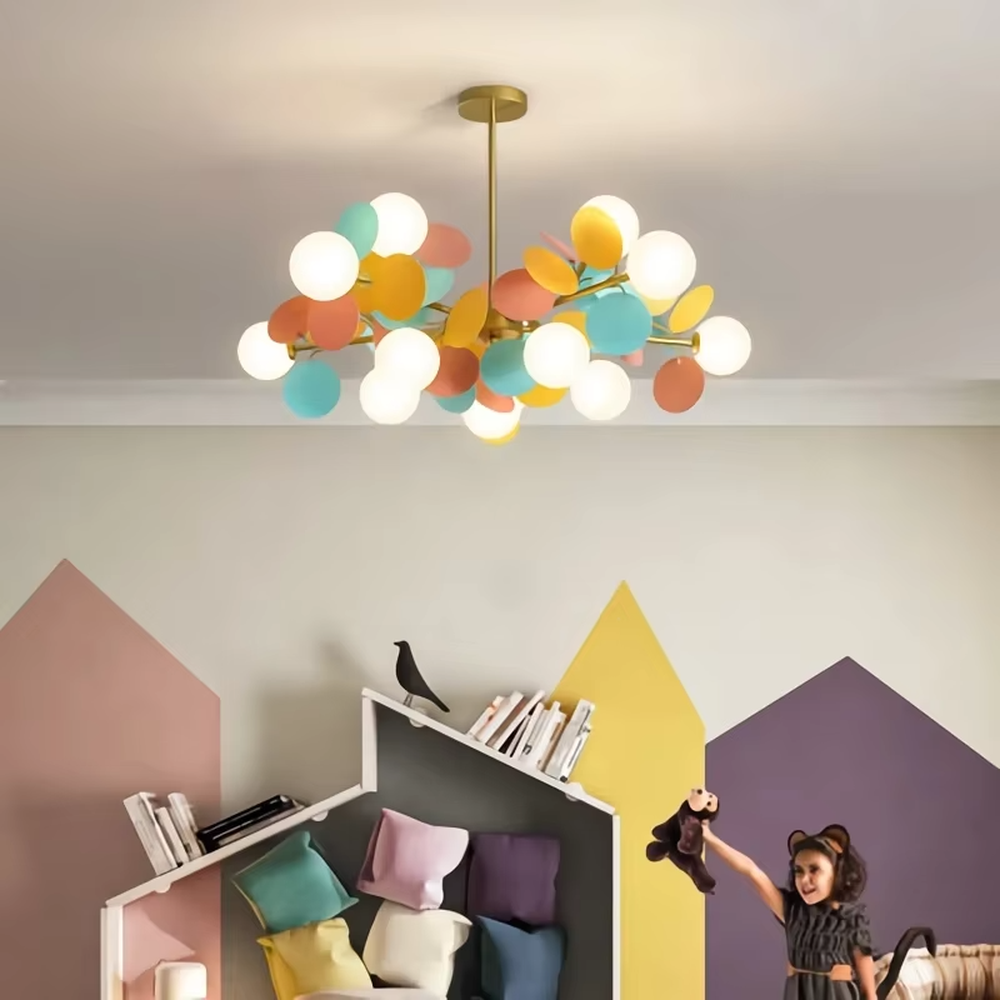 This playful and colorful disc chandelier features a gold metal frame, paired with milky white glowing spheres and macaron-colored (pink, orange, blue, yellow) decorative discs arranged in a staggered layout. When lit, it emits a soft and warm glow, creating a lively and comforting atmosphere. Ideal for kids' bedrooms, parent-child play areas, kindergartens, and other spaces, it adds a dreamy and romantic touch to childlike environments.