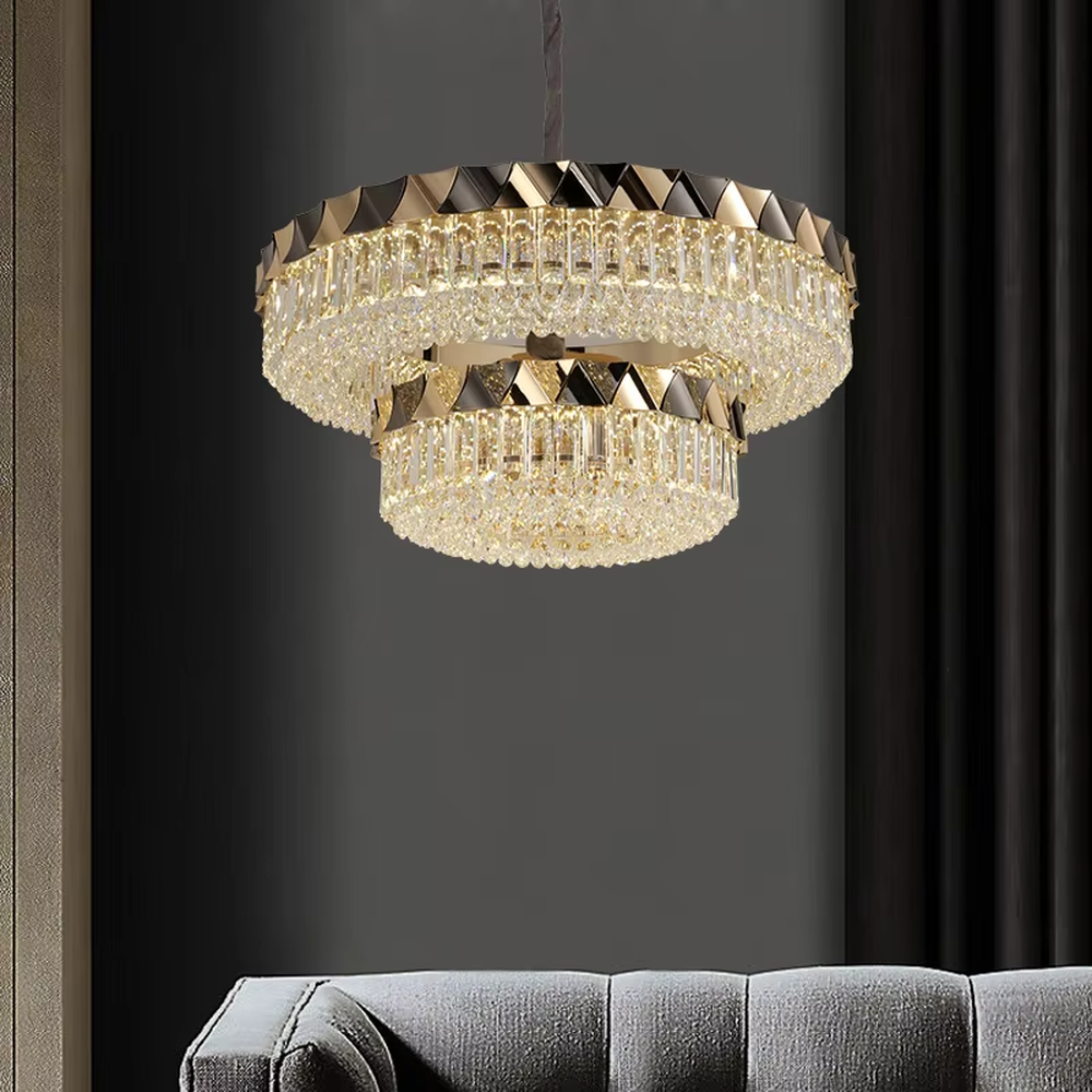 This modern light luxury two-layer circular crystal chandelier features a black-and-gold metal frame, inlaid with transparent long crystals to form a double-layered dome shape. The geometric black-and-gold metal contrasts brilliantly with the shimmering crystal, and when lit, light refracts through the crystal to emit a luxurious and soft glow, combining a sophisticated texture with an ambient atmosphere. Ideal for living rooms, dining rooms, light luxury apartments, and other spaces, it adds an exquisite and luxurious touch to modern minimalist or light luxury home environments.