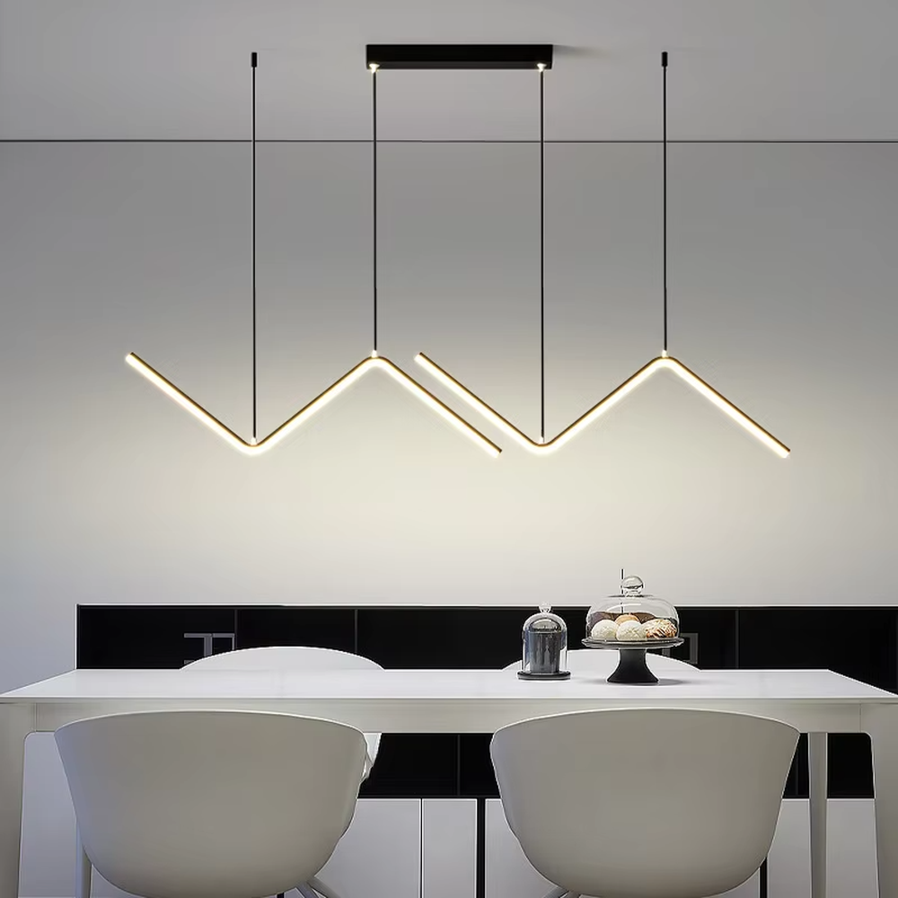 Modern minimalist mountain-shaped linear chandelier, featuring a gold metal frame paired with LED light strips to create staggered mountain contour lines. It emits soft and even light, combining design sense and ambiance, making it a decorative lighting fixture that elevates the space's style.
