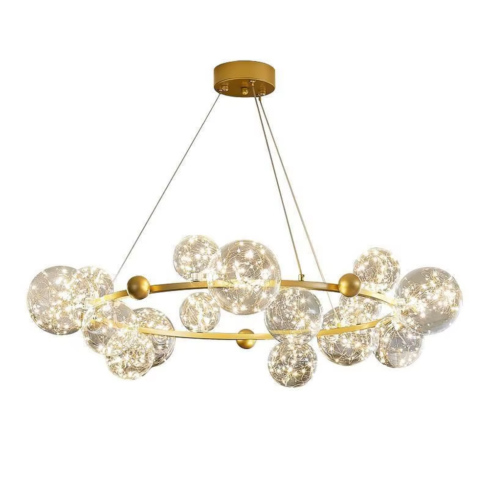 This modern light luxury circular magic bean chandelier features a gold metal ring frame and multiple glass ball lampshades with a starry sky effect inside. When lit, it emits a soft and warm starry glow, combining decorative appeal with an ambient atmosphere. Ideal for living rooms, dining rooms, large apartments, and other spaces, it adds a romantic and exquisite touch to modern light luxury, minimalist, or Nordic-style home environments.