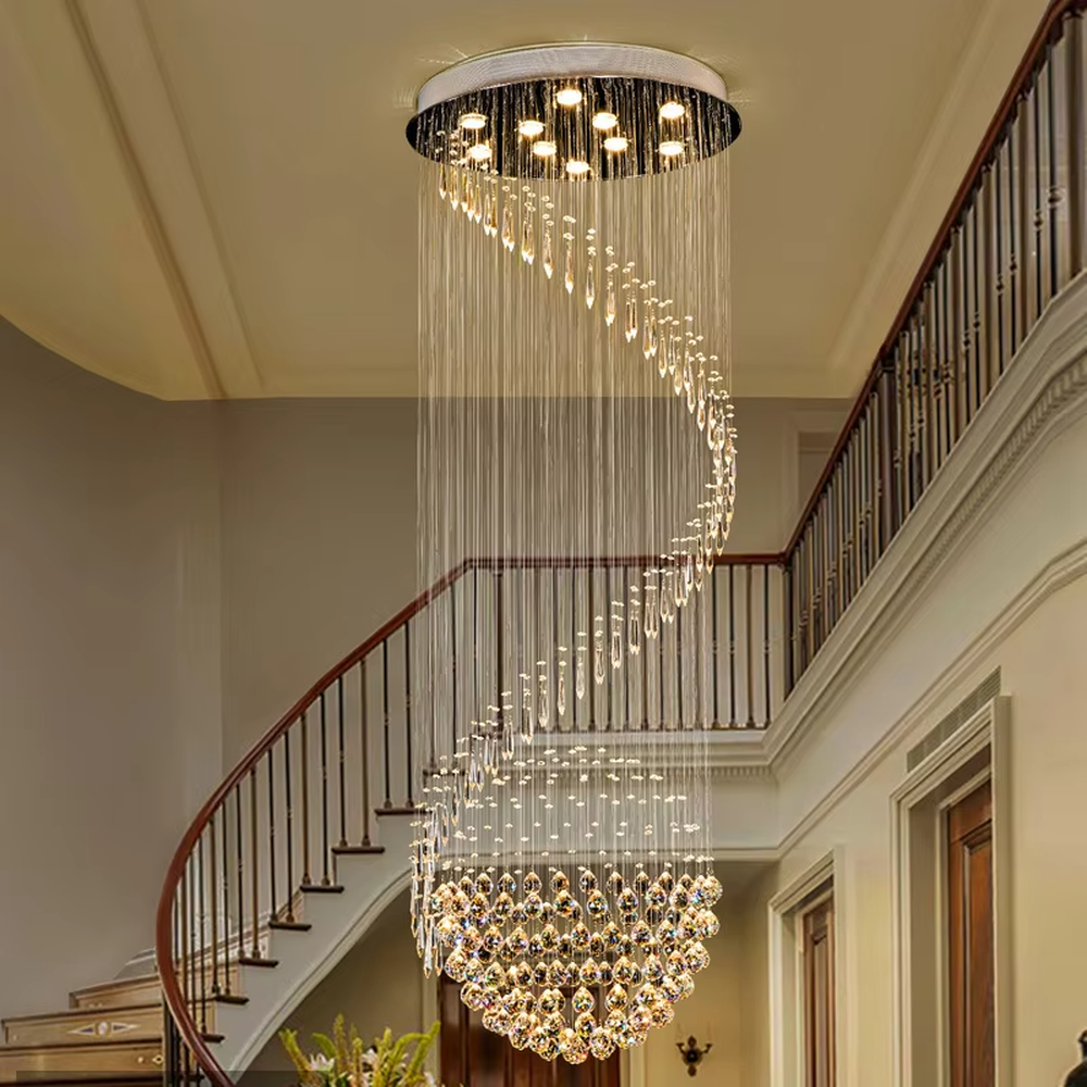 This European luxury spiral staircase crystal chandelier features a metal ceiling base, with dense crystal bead strings hanging down to form a dynamic spiral-rising shape. When lit, light refracts through the crystal to emit a brilliant and soft glow, combining a dynamic texture with an ambient atmosphere. Ideal for villa high-ceiling living rooms, hotel lobbies, duplex hollow spaces, and other areas, it adds an elegant and exquisite touch to European luxury or modern light luxury environments.