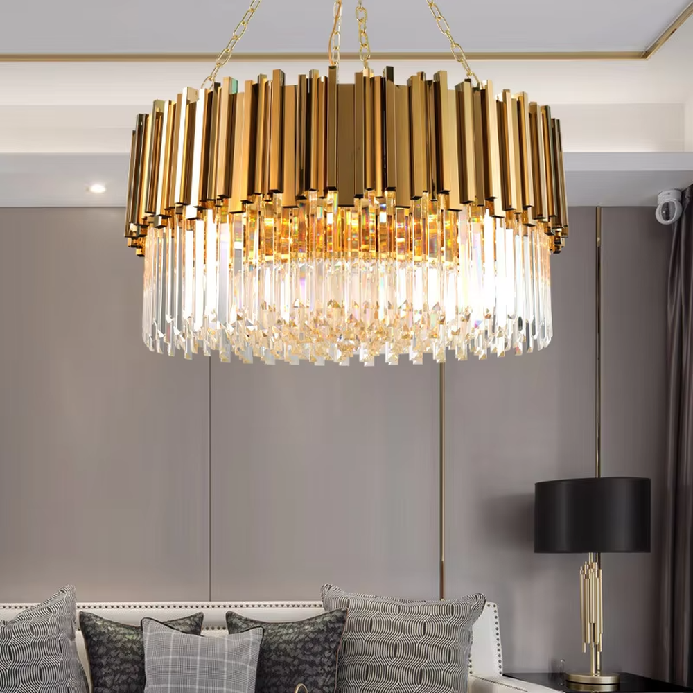 This modern light luxury two-layer linear chandelier features a gold metal strip frame on the upper layer and dense transparent long crystals hanging below, suspended by gold chains. When lit, light refracts through the crystals to emit a brilliant and soft glow, combining a luxurious texture with an ambient atmosphere. Ideal for dining rooms, bars, light luxury apartments, and other spaces, it adds an exquisite and sophisticated touch to modern minimalist or light luxury home environments.