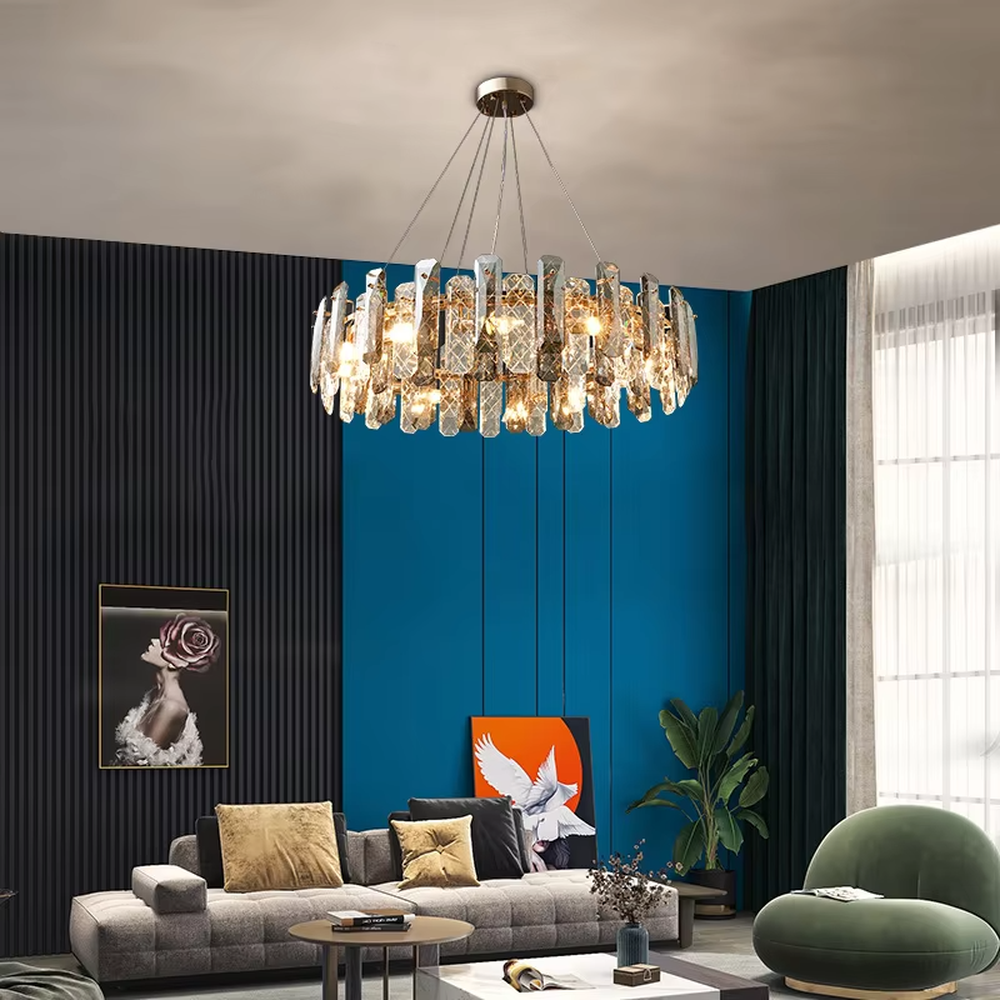 This modern light luxury circular crystal chandelier features a metal frame, inlaid with multi-faceted cut crystal pieces to form a rounded shape. When lit, light refracts through the crystal to emit a brilliant and luxurious glow, combining an exquisite texture with an ambient atmosphere. Ideal for living rooms, dining rooms, light luxury apartments, and other spaces, it adds an exquisite and sophisticated touch to modern minimalist or light luxury home environments.