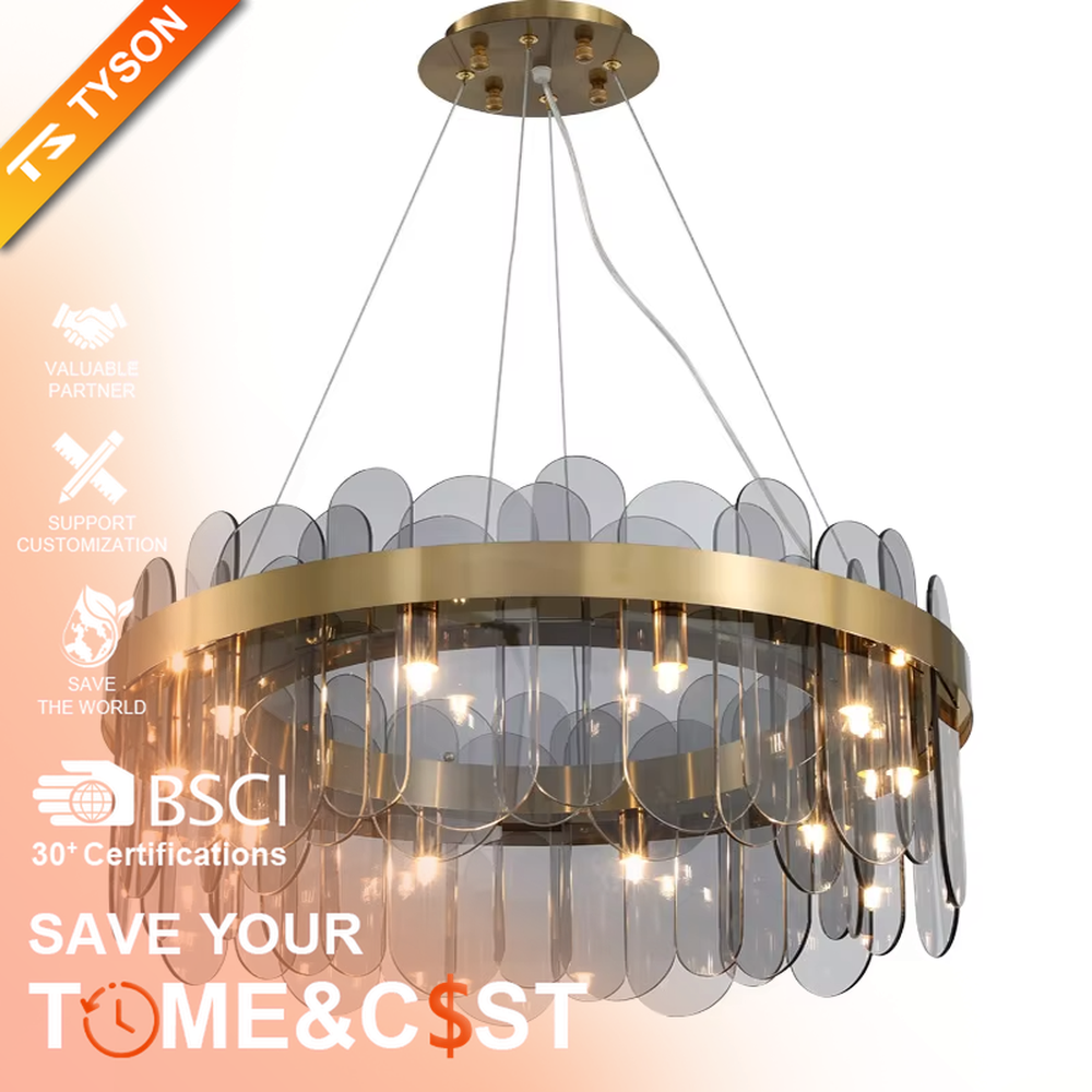 Modern light luxury smoky gray glass chandelier, featuring a ring frame in gold metal paired with layered smoky gray curved glass panels. Light refracts through the glass to create a soft and translucent glow, combining sophistication and ambiance, making it a decorative lighting fixture that elevates the space's style.
