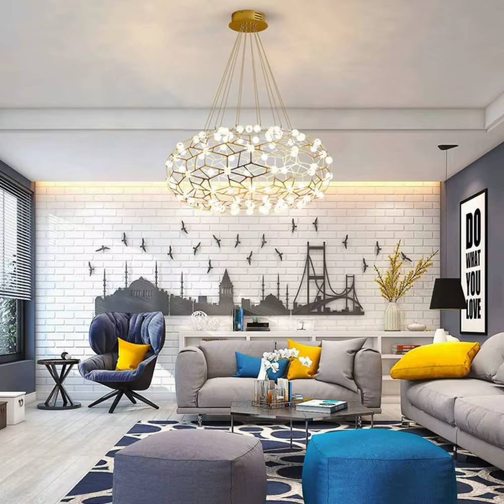 Modern light luxury honeycomb-structure oval chandelier, featuring a bionic honeycomb frame made of gold metal and covered with glowing light beads. It emits soft and brilliant light, combining a sense of technology and artistic ambiance, making it a high-end decorative lighting fixture that elevates the space's style.