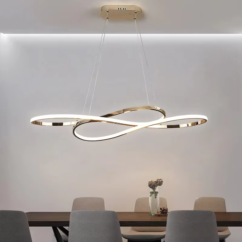 Modern light luxury infinity ring linear chandelier, featuring a fluid interwoven infinity ring structure in polished metal with built-in soft LED lighting. Its dynamic and elegant lines combine a futuristic feel and ambiance, making it a modern home lighting fixture that elevates the space's aesthetic.