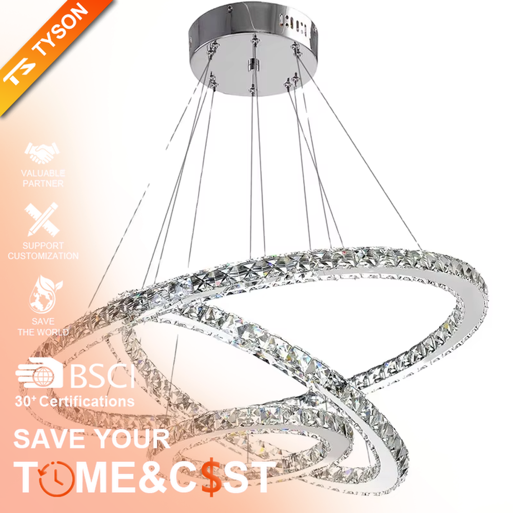 This modern light luxury interwoven ring crystal chandelier consists of transparent crystal rings of varying sizes interlaced and nested, suspended by silver cords. When lit, light refracts through the crystal to emit a brilliant and dynamic glow, combining a futuristic feel with an ambient atmosphere. Ideal for high-ceiling living rooms, villa foyers, light luxury apartments, and other spaces, it adds an exquisite and sophisticated touch to modern minimalist or light luxury environments.