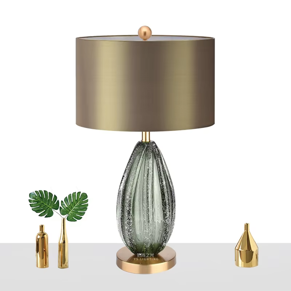 Light luxury dark brown fabric lampshade teardrop-textured table lamp, black-gray textured base + golden base, soft lighting, creating a high-end elegant atmosphere.