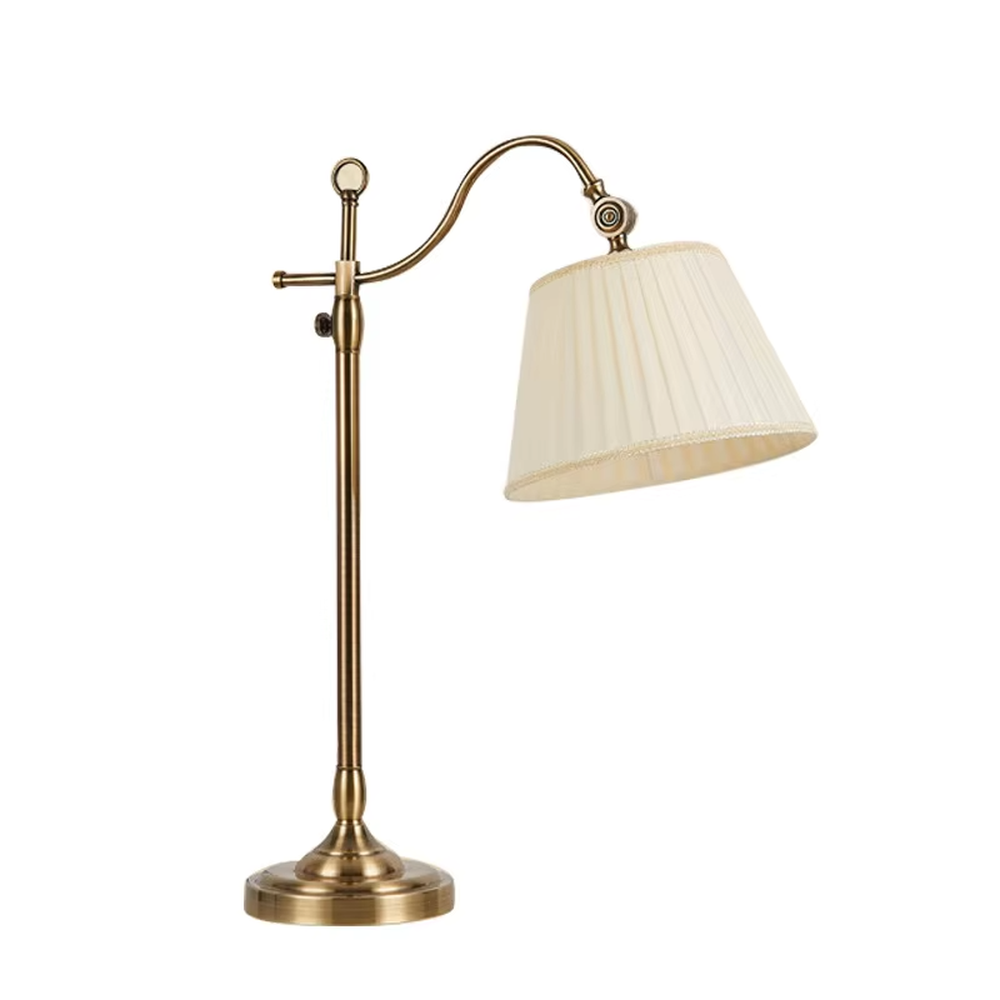 This is a retro European-style brass fabric table lamp, with a brass metal structure (with an adjustable curved arm and decorative details) and a beige pleated fabric lampshade. It features an exquisite retro design and soft warm lighting. It is used for local desktop lighting and decoration, creating a retro and warm atmosphere. Suitable for European-style bedrooms, studies, retro-style living rooms and other places.
