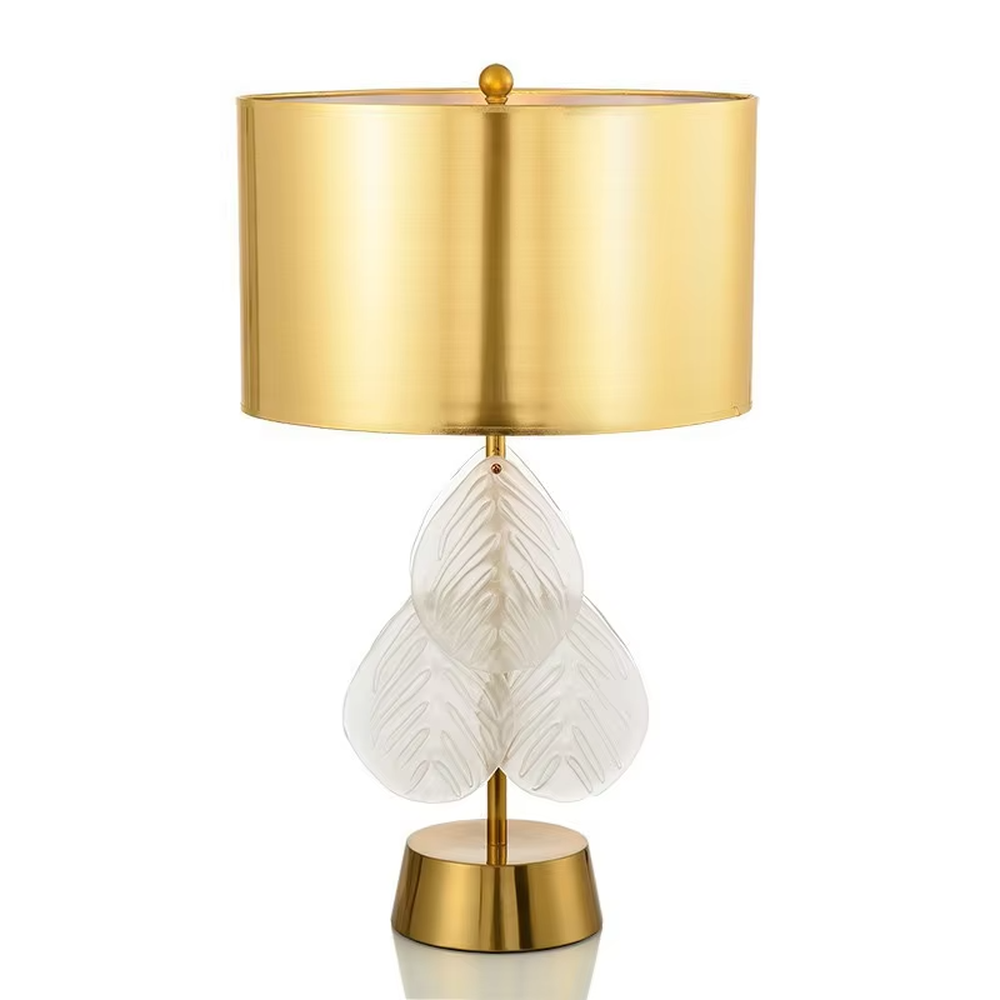 This is a light luxury artistic-style gold and white leaf-decorated table lamp, with a golden metal lampshade and base, paired with transparent leaf-shaped decorations (with texture). It features an exquisite light luxury design, with warm and soft lighting. It is used for local desktop lighting and decoration, creating a light luxury artistic atmosphere. Suitable for light luxury-style bedroom bedside tables, modern minimalist living room side tables, high-end home studies and other places.