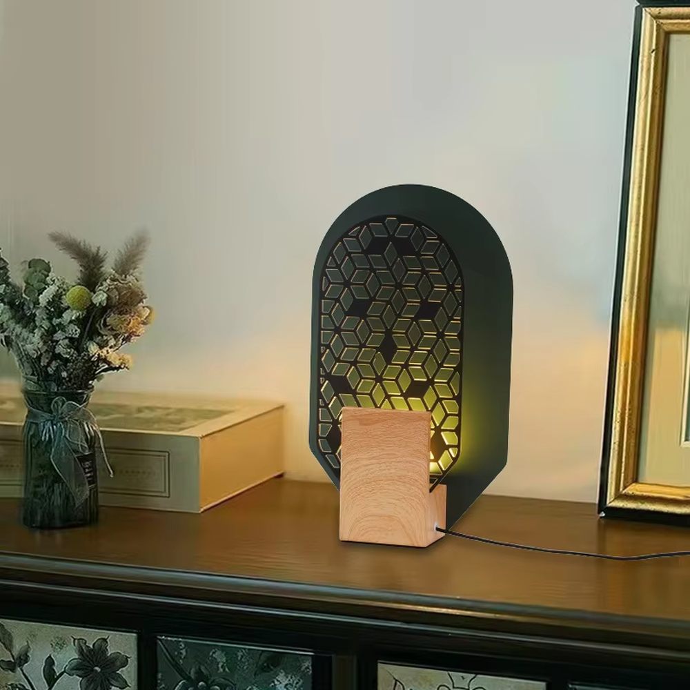 This is an artistic geometric hollow arch table lamp, with an arched hollow design (hexagonal geometric pattern), available in styles like white and orange, paired with different material bases. It features strong artistic sense, and the light forms unique light and shadow through the hollow. It is used for local desktop lighting and decoration, creating an artistic and warm atmosphere. Suitable for art exhibition halls, corners of modern home studies, designer studios and other places.