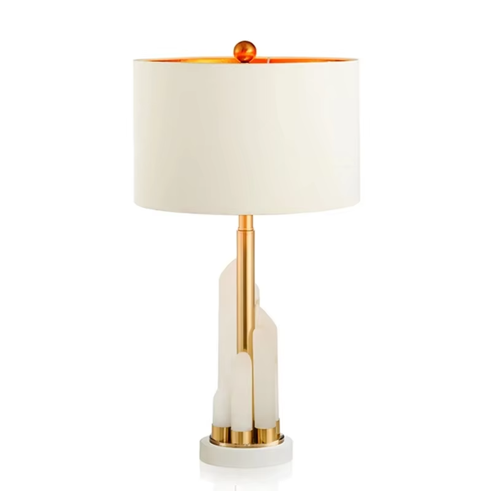 Light luxury white shade gold decorative marble base table lamp, white fabric lampshade + golden metal decorations + white marble base, soft lighting, creating a high-end elegant atmosphere.