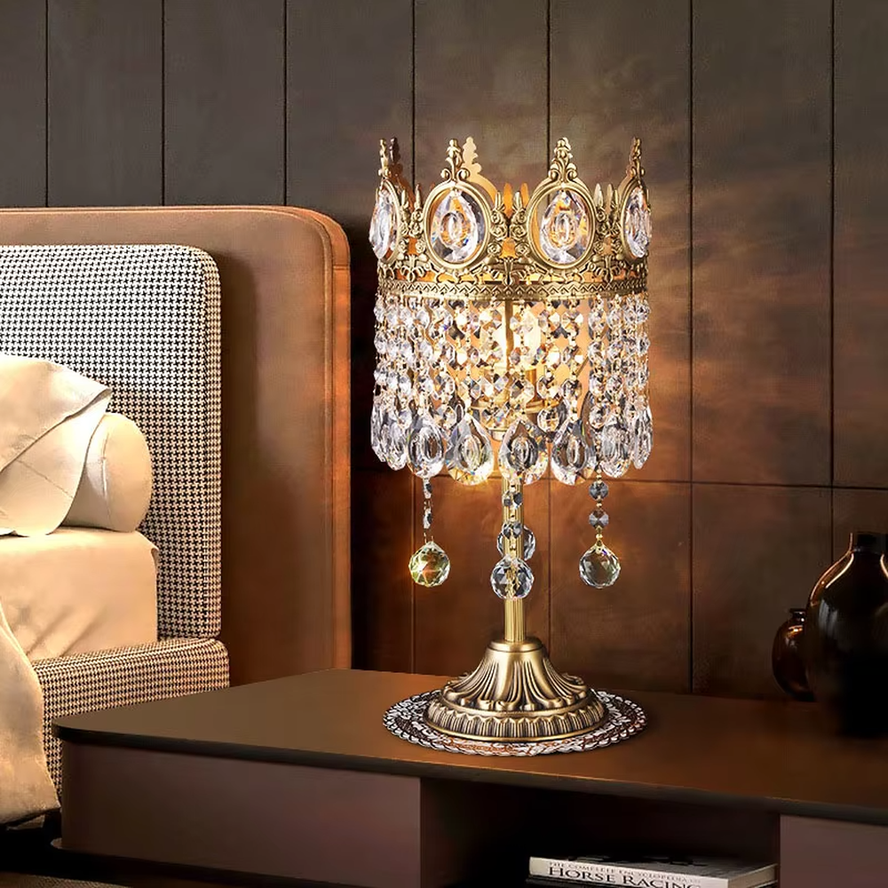 This is a luxurious palace-style crown-shaped crystal lamp (including floor lamp and table lamp styles), with a golden metal crown frame paired with crystal pendants, featuring a magnificent and noble design, and brilliant and gorgeous lighting. It is used for space lighting and decoration, creating a luxurious palace atmosphere. Suitable for luxury living rooms, bedrooms, high-end hotel guest rooms and other places.