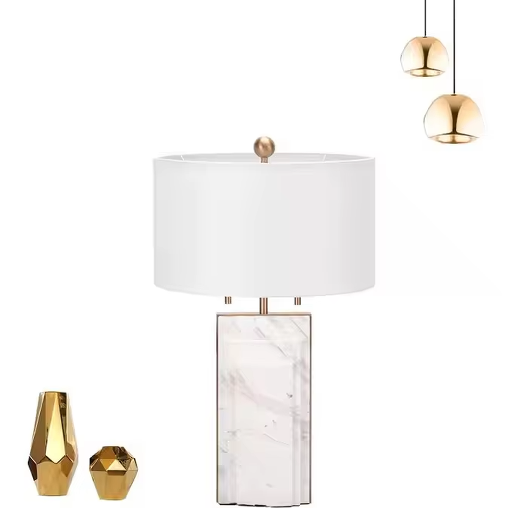 This is a luxury-style black-gold marble table lamp, with a black marble-textured base, golden metal parts, and a beige fabric circular lampshade, featuring a minimalist and grand design with strong luxury texture. It is used for local desktop lighting and decoration, creating a luxury and modern atmosphere. It is suitable for luxury-style home bedroom bedside tables, high-end hotel guest rooms, modern minimalist living room side tables and other places.