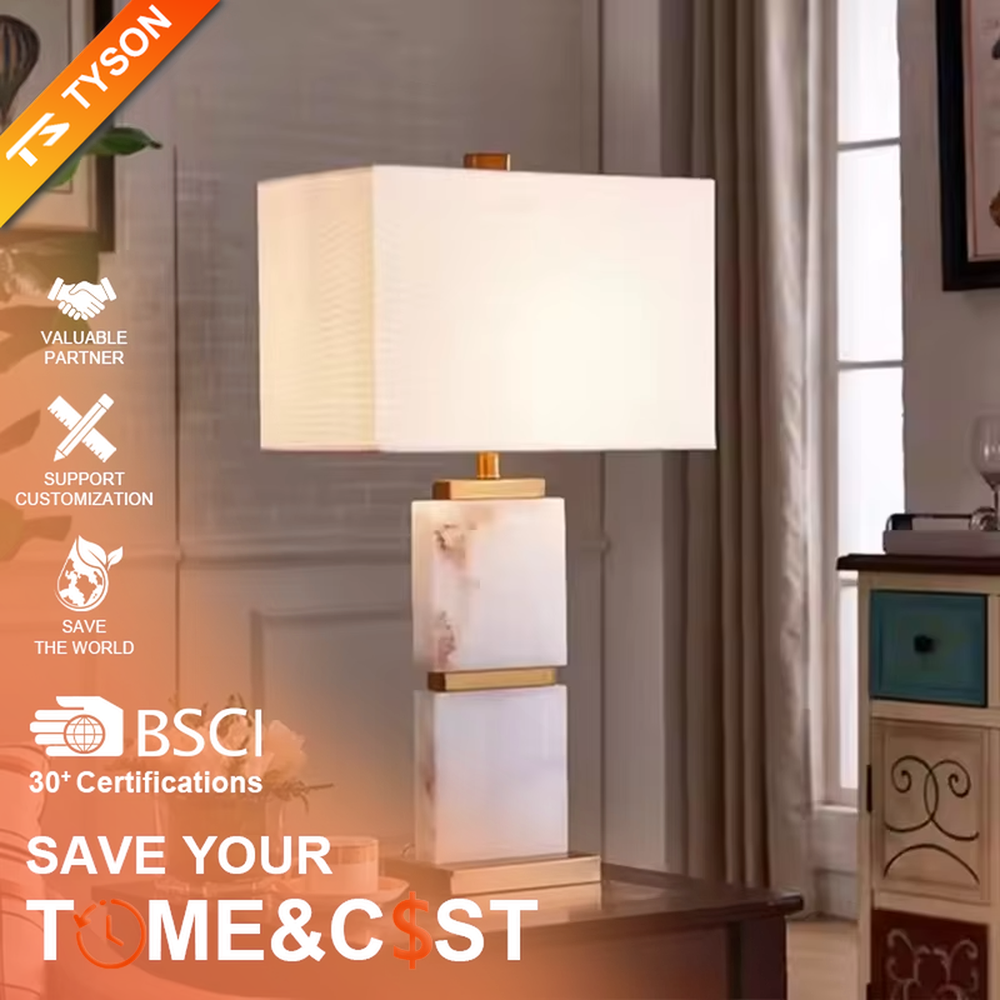 Light luxury white veined stone gold-decor rectangular fabric lampshade table lamp, white veined stone main body + golden metal decoration + white fabric lampshade, soft light, creating a high-end light luxury atmosphere.