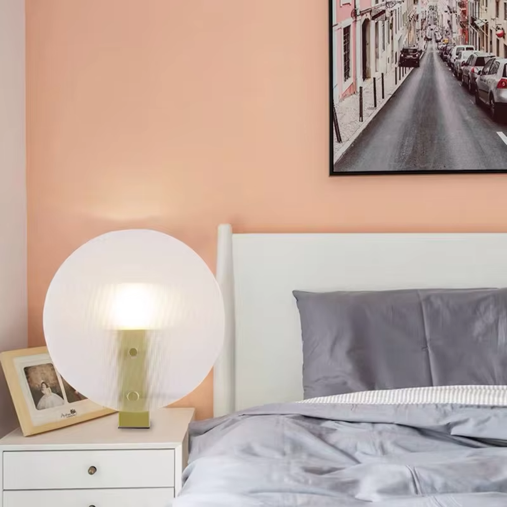 Modern artistic circular texture decorative table lamp, black base + spherical soft light shade, soft and warm lighting, creating a high-end minimalist atmosphere.