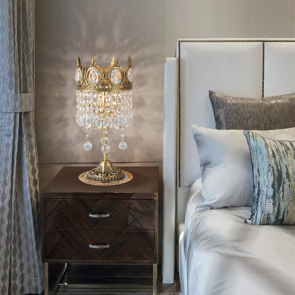 This is a luxurious palace-style crown-shaped crystal lamp (including floor lamp and table lamp styles), with a golden metal crown frame paired with crystal pendants, featuring a magnificent and noble design, and brilliant and gorgeous lighting. It is used for space lighting and decoration, creating a luxurious palace atmosphere. Suitable for luxury living rooms, bedrooms, high-end hotel guest rooms and other places.