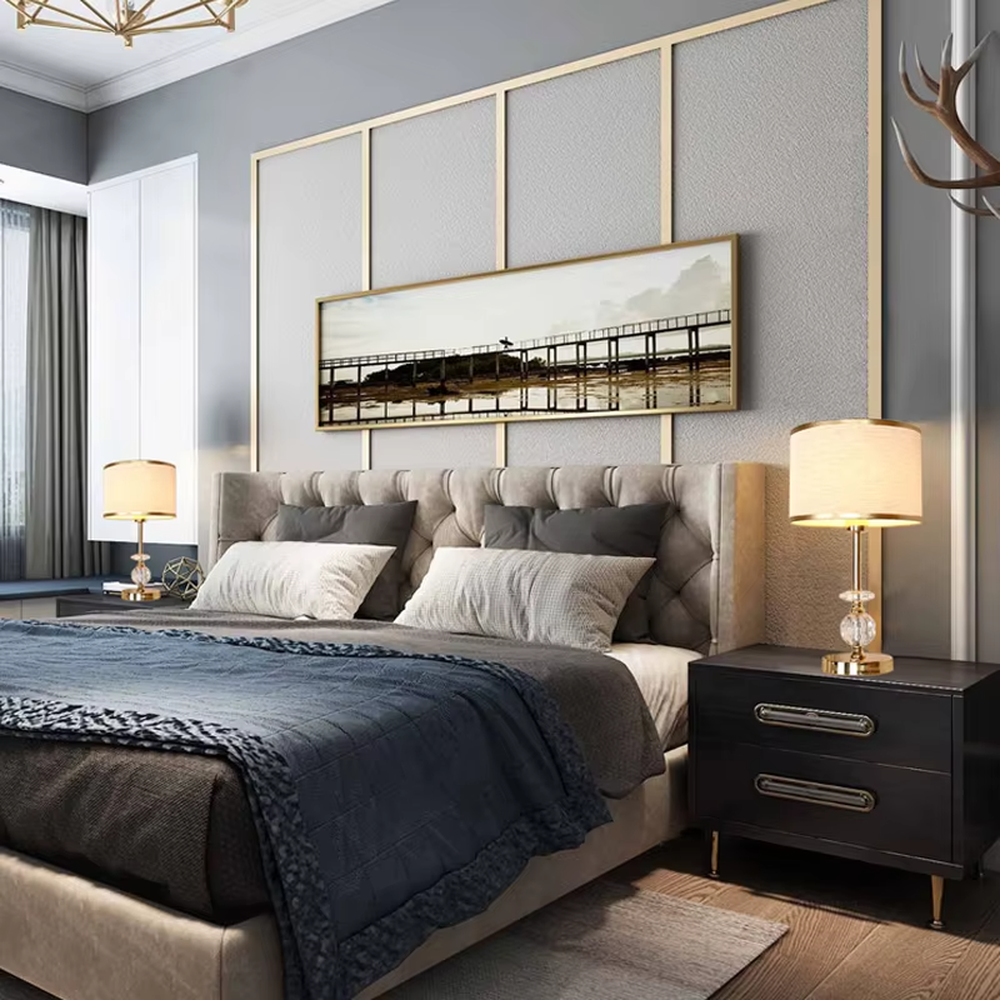 This is a light luxury exquisite fabric crystal table lamp, with a beige fabric lampshade paired with a golden trim, a golden metal lamp pole embedded with transparent cut crystal decorations, a high-quality golden base, and soft and elegant lighting, creating a light luxury exquisite atmosphere.