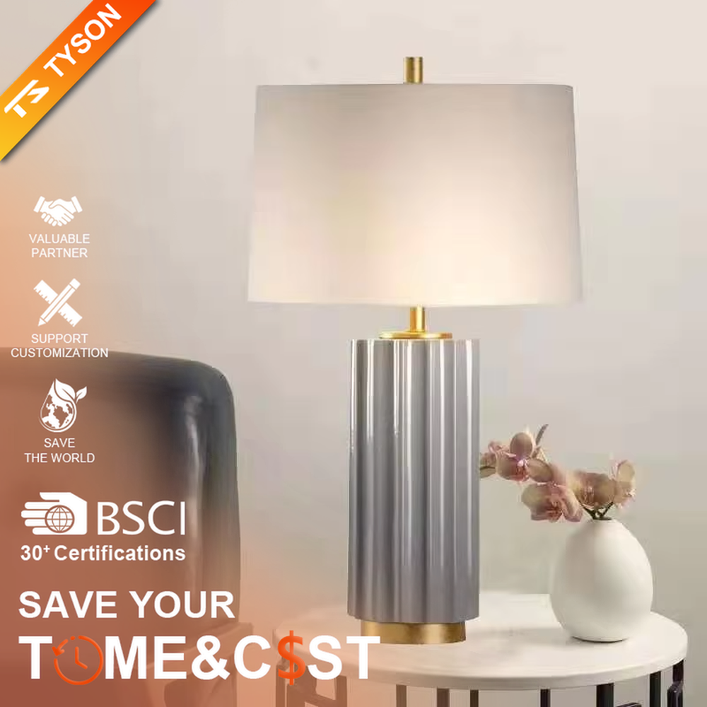 This is a luxury artistic agate-textured table lamp, with a golden metal frame inlaid with blue agate texture decoration and a white square fabric lampshade, featuring a minimalist and grand design with both artistic sense and luxury texture. It is used for local desktop lighting and decoration, creating a luxury artistic atmosphere. It is suitable for luxury-style home bedroom bedside tables, high-end hotel guest rooms, art exhibition hall display tables and other places.