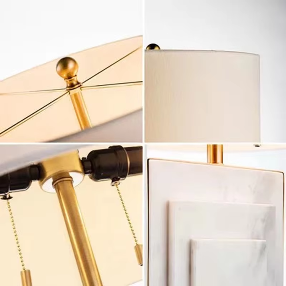 This is a luxury-style black-gold marble table lamp, with a black marble-textured base, golden metal parts, and a beige fabric circular lampshade, featuring a minimalist and grand design with strong luxury texture. It is used for local desktop lighting and decoration, creating a luxury and modern atmosphere. It is suitable for luxury-style home bedroom bedside tables, high-end hotel guest rooms, modern minimalist living room side tables and other places.