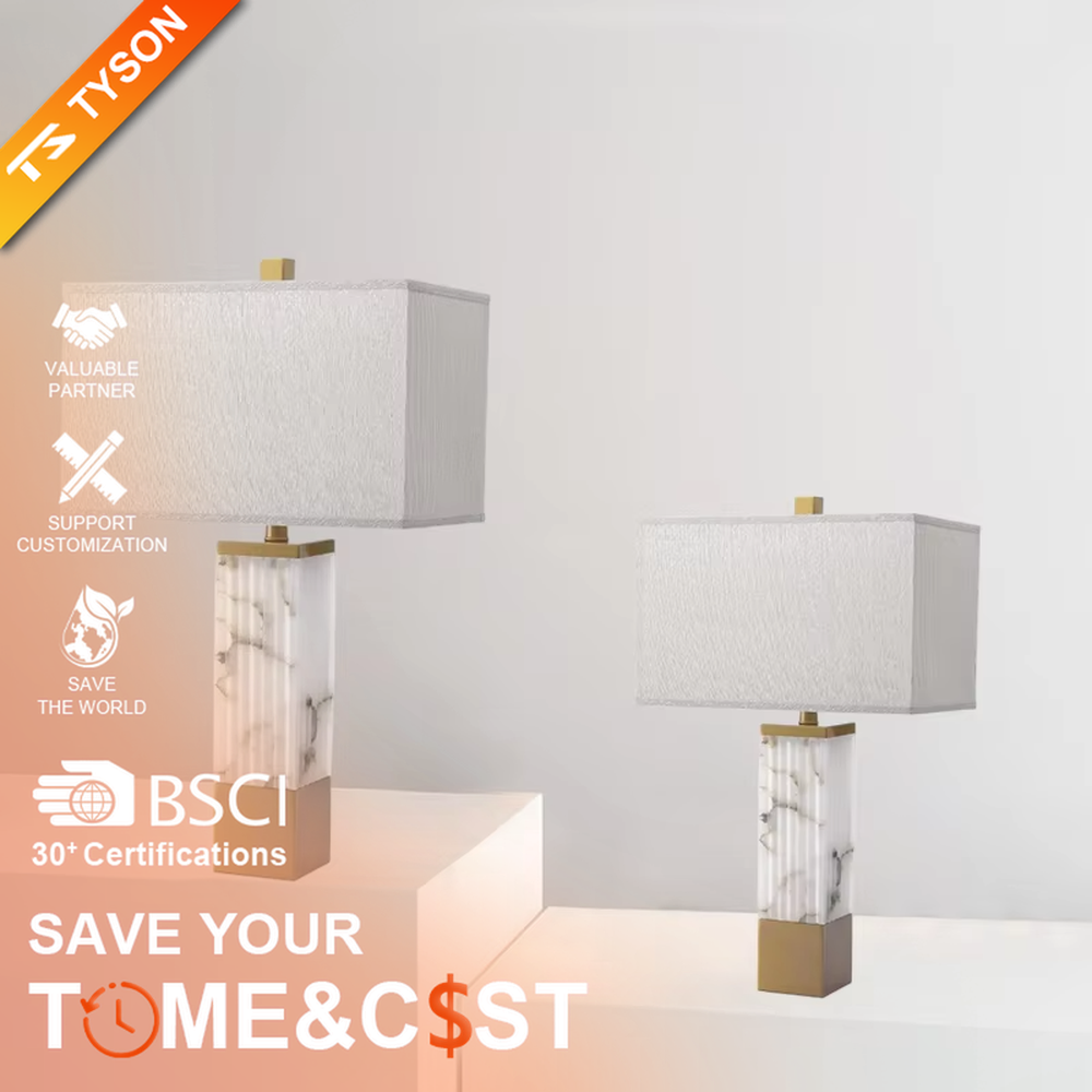 This is a luxury marble table lamp, with a white marble (textured) base, golden metal components, and a white fabric square lampshade, featuring a minimalist luxury design with high-quality texture. It is used for local desktop lighting and decoration, creating a high-end luxury atmosphere. It is suitable for luxury-style home bedroom bedside tables, high-end hotel guest rooms, modern soft decoration display spaces and other places.