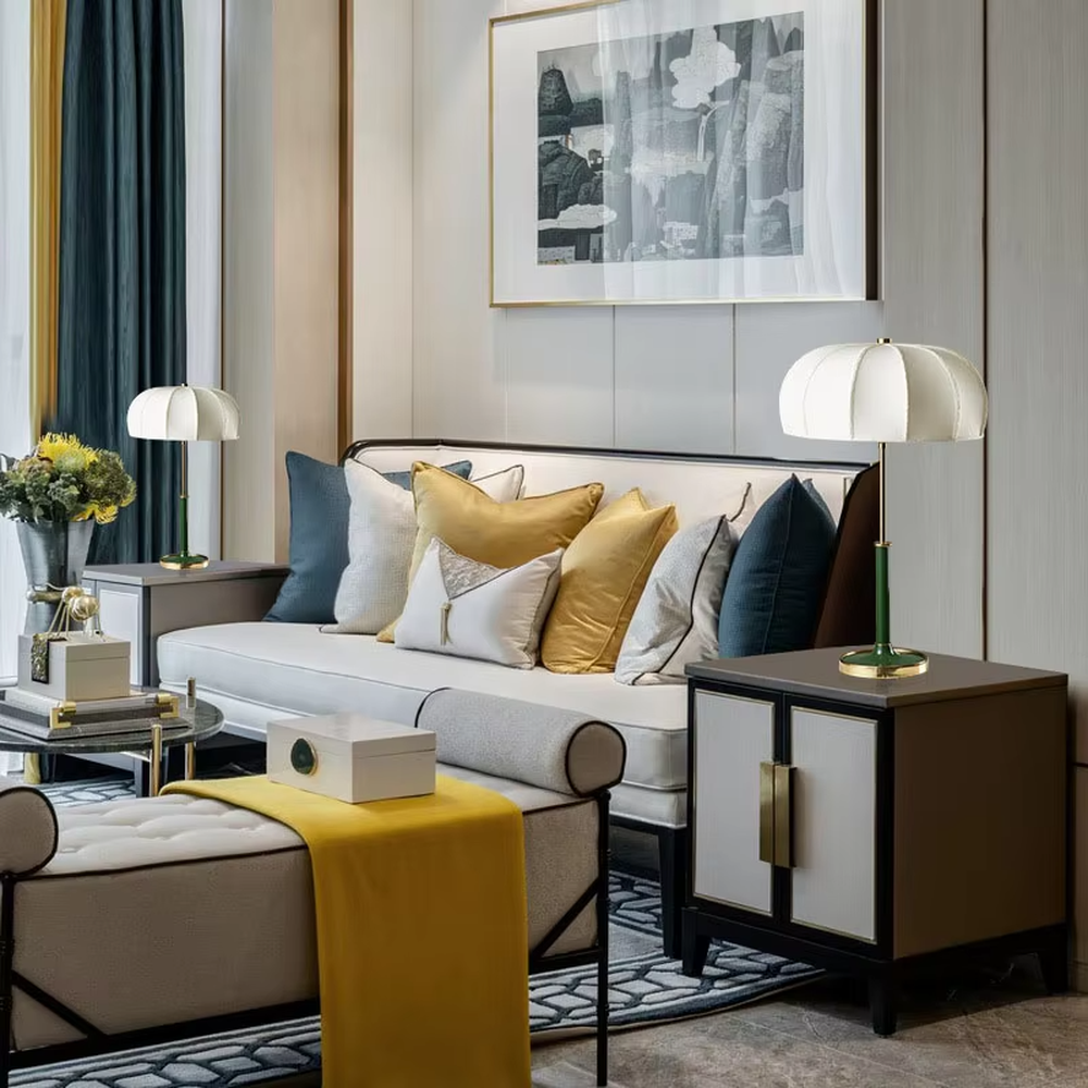 This is a light luxury retro umbrella - shaped fabric table lamp, with a white umbrella - shaped fabric lampshade paired with golden and dark green metal stands, and a golden base. It features a minimalist retro and light luxury elegant design, with warm and soft lighting. It is used for local desktop lighting and decoration, creating a light luxury retro atmosphere. Suitable for light luxury - style bedroom bedside tables, modern retro - style living room side tables, high - end hotel guest rooms and other places.