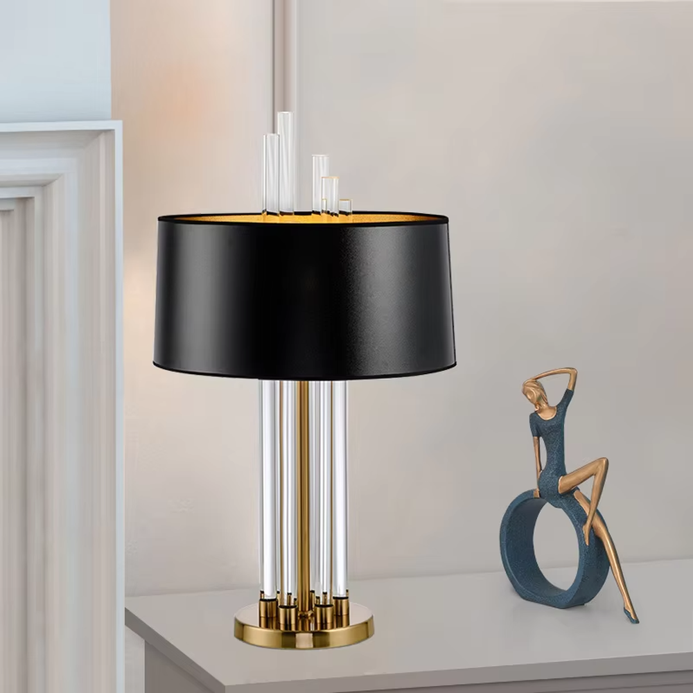 Light luxury black-gold crystal column table lamp, black cylindrical lampshade (gold lining) + transparent crystal lamp pole + gold base, elegant lighting, creating a high-end light luxury atmosphere.