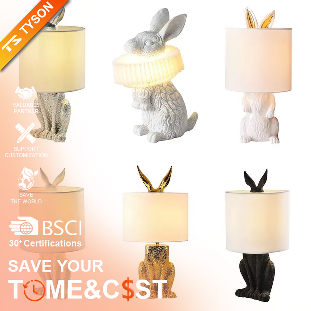 This is a cute and adorable rabbit-shaped table lamp, with a white rabbit-shaped base paired with golden ear decorations, and a white cylindrical lampshade. It has a warm and cute style, with soft and comfortable lighting.