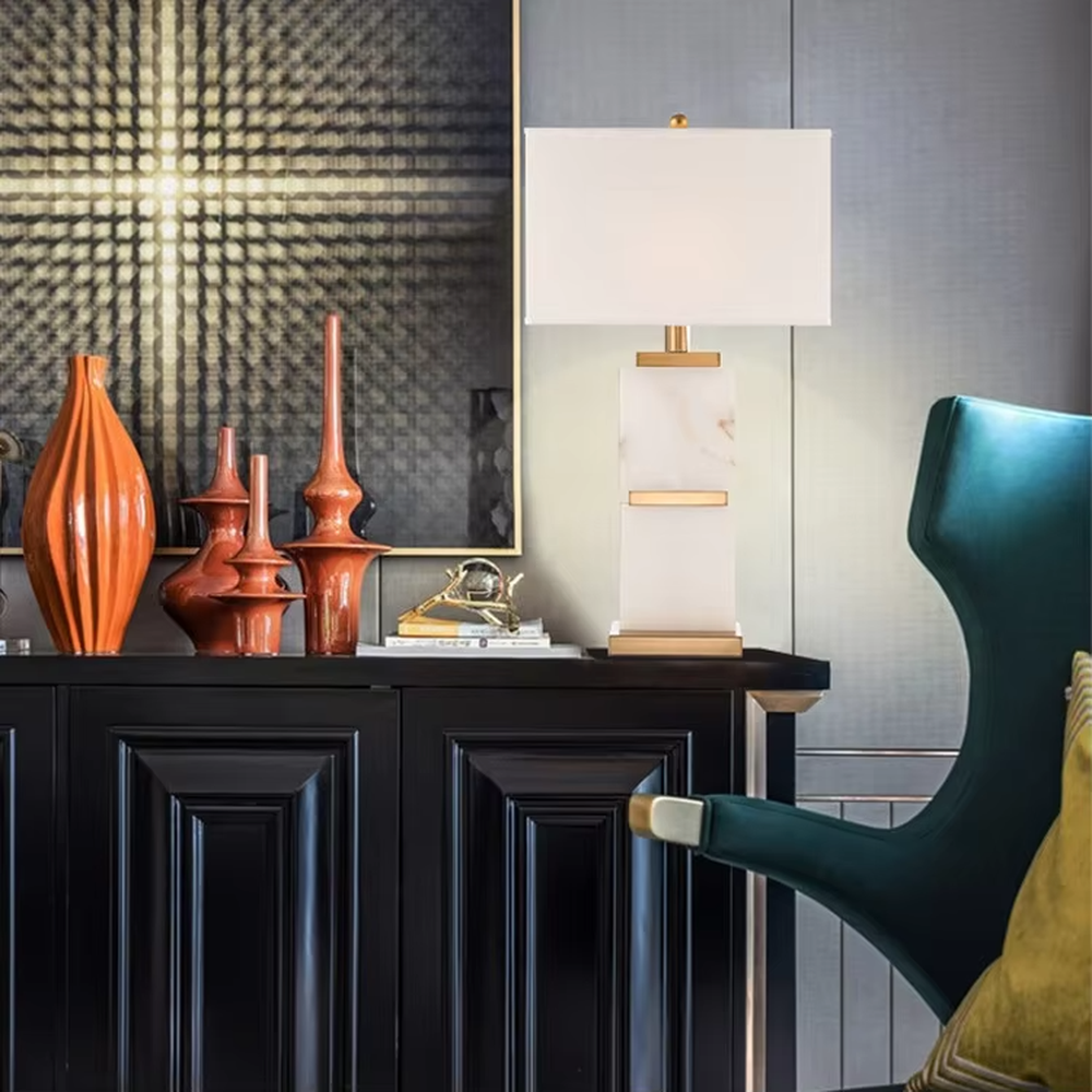 Light luxury white veined stone gold-decor rectangular fabric lampshade table lamp, white veined stone main body + golden metal decoration + white fabric lampshade, soft light, creating a high-end light luxury atmosphere.