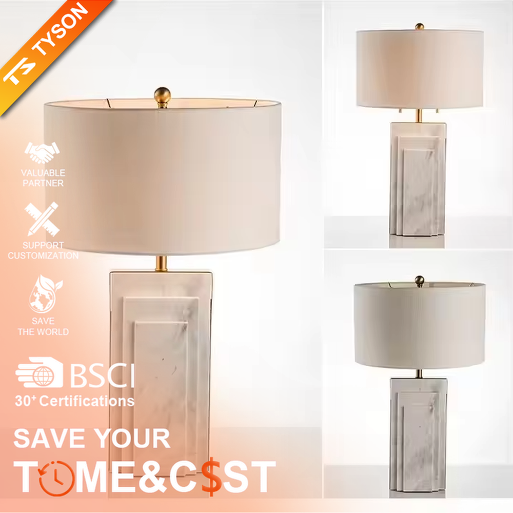 This is a luxury-style black-gold marble table lamp, with a black marble-textured base, golden metal parts, and a beige fabric circular lampshade, featuring a minimalist and grand design with strong luxury texture. It is used for local desktop lighting and decoration, creating a luxury and modern atmosphere. It is suitable for luxury-style home bedroom bedside tables, high-end hotel guest rooms, modern minimalist living room side tables and other places.