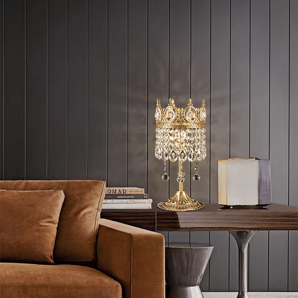 This is a luxurious palace-style crown-shaped crystal lamp (including floor lamp and table lamp styles), with a golden metal crown frame paired with crystal pendants, featuring a magnificent and noble design, and brilliant and gorgeous lighting. It is used for space lighting and decoration, creating a luxurious palace atmosphere. Suitable for luxury living rooms, bedrooms, high-end hotel guest rooms and other places.