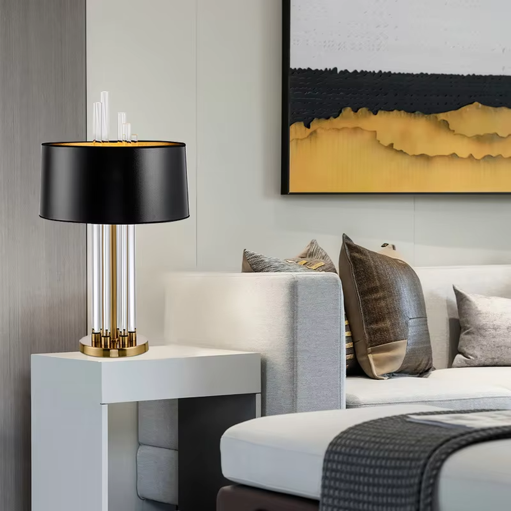 Light luxury black-gold crystal column table lamp, black cylindrical lampshade (gold lining) + transparent crystal lamp pole + gold base, elegant lighting, creating a high-end light luxury atmosphere.