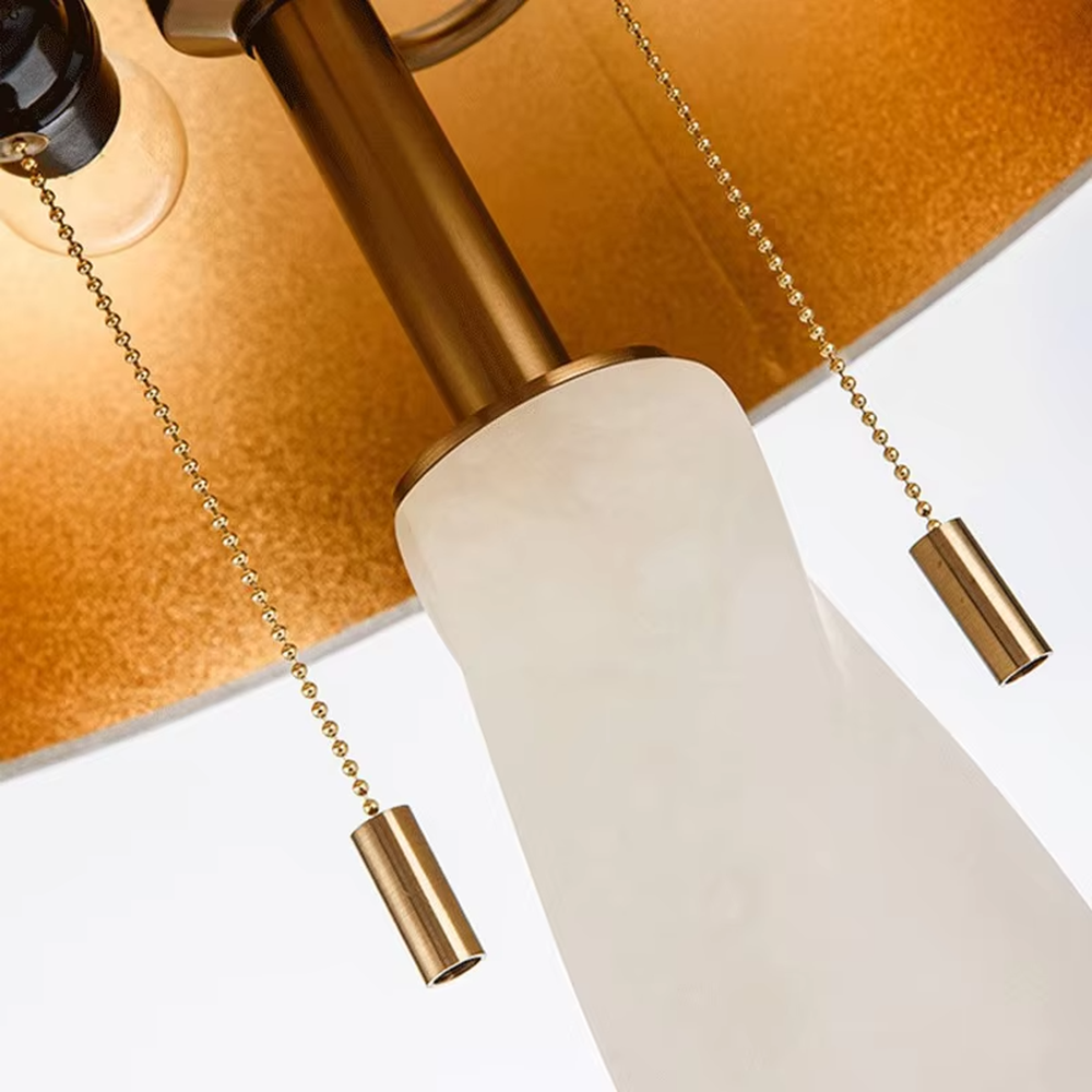 This is a modern artistic twisted table lamp, with a white twisted base, golden metal components, and a white fabric circular lampshade, featuring a strong artistic sense and luxury texture. It is used for local desktop lighting and decoration, creating an artistic luxury atmosphere. It is suitable for modern art home bedroom bedside tables, designer studios, high-end hotel guest rooms and other places.