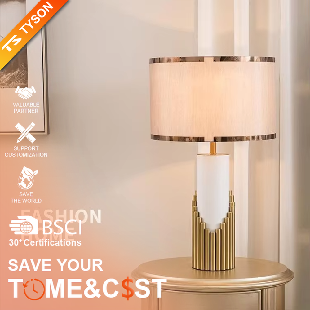 This is a light luxury-style gold and white metal fabric table lamp, with a golden staggered metal column base, paired with a white cylinder and a beige fabric lampshade (golden edging). It features a minimalist light luxury design, with warm and soft lighting. It is used for local desktop lighting and decoration, creating a light luxury and warm atmosphere. Suitable for light luxury-style bedroom bedside tables, modern minimalist living room side tables, high-end hotel guest rooms and other places.
