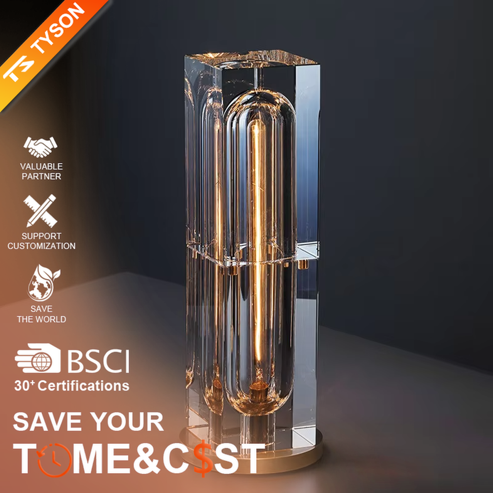 Modern light luxury transparent square column crystal shade gold base Edison bulb table lamp, warm light effect, creating a retro luxurious atmosphere.