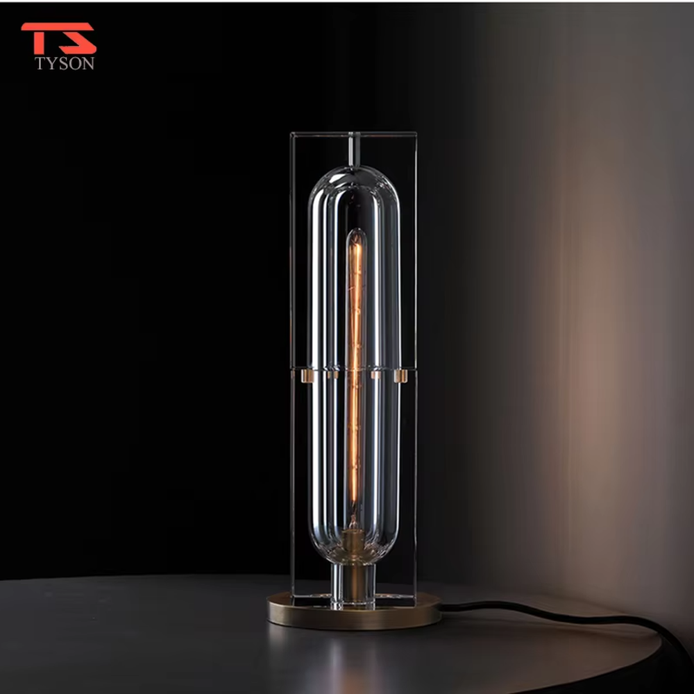 Modern light luxury cut crystal column table lamp, with a transparent multi-faceted cut crystal lamp body paired with a gold metal base, emitting soft and transparent light, combining decorativeness and practicality, suitable for lighting and decoration in spaces such as bedroom nightstands, living room side tables, and hotel guest rooms.