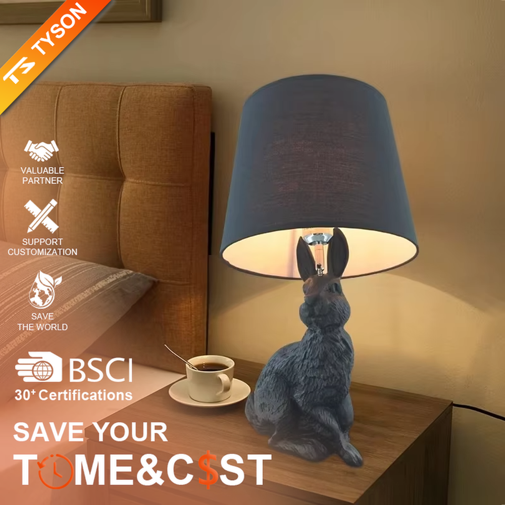 This dark art style table lamp features a bionic rabbit-shaped base made of black resin, paired with a black fabric cylindrical lampshade. The rabbit-lifting-lampshade design is full of fantasy, serving both lighting and decorative purposes, ideal for trendy toy spaces, personalized homes, internet-famous shops and other scenarios.