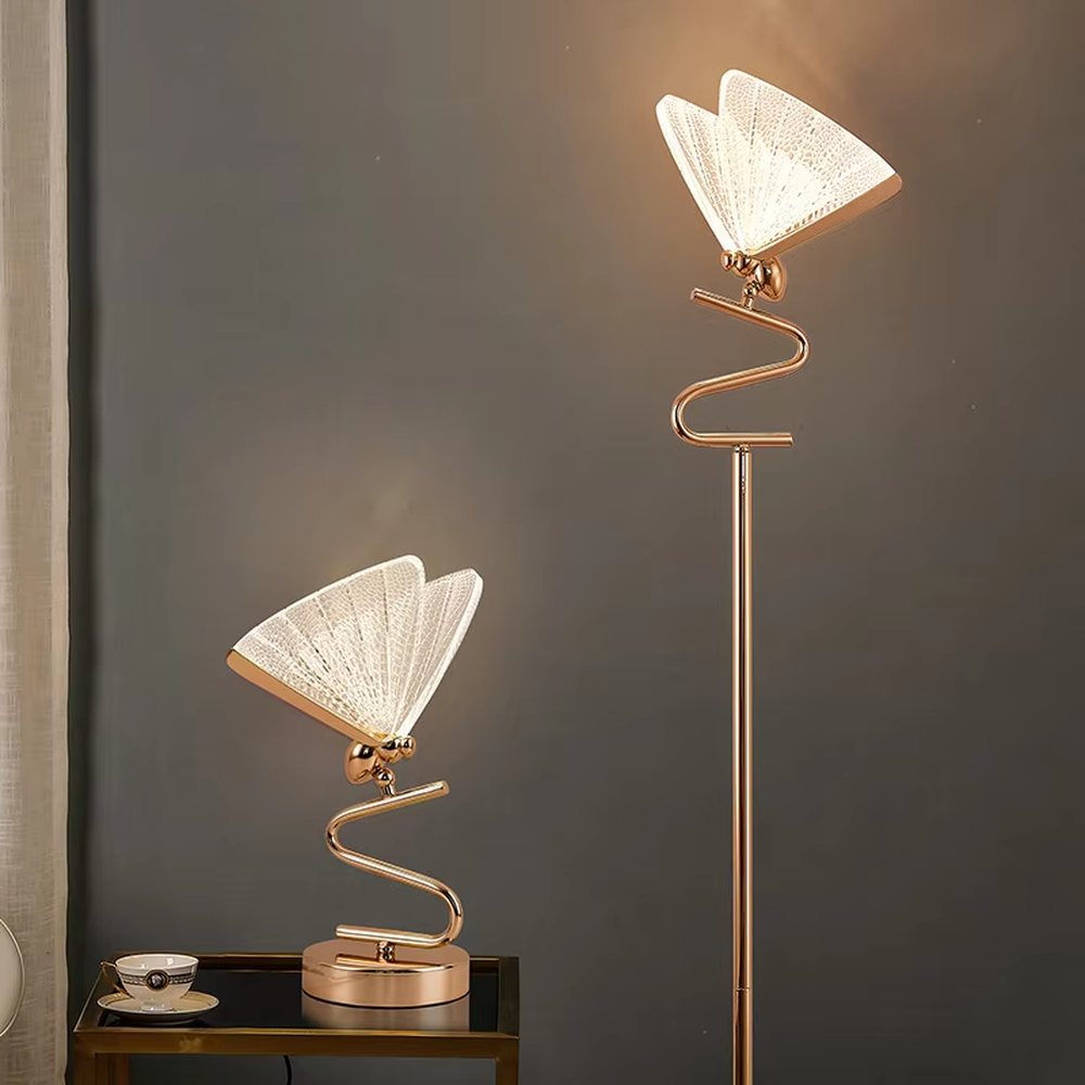 This light luxury modern table lamp features a gold S-shaped metal stand, paired with a ginkgo leaf-shaped textured translucent lampshade, supports angle adjustment, serves both lighting and decorative purposes, ideal for light luxury spaces such as bedroom bedside tables, living room side tables, and hotel guest rooms.
