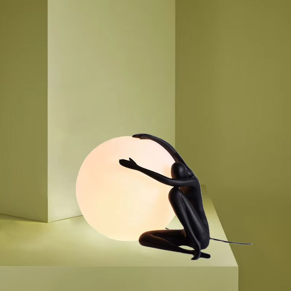 Artistic deep blue humanoid sculpture embracing spherical soft light table lamp, warm light effect, creating a high-end creative artistic space atmosphere.