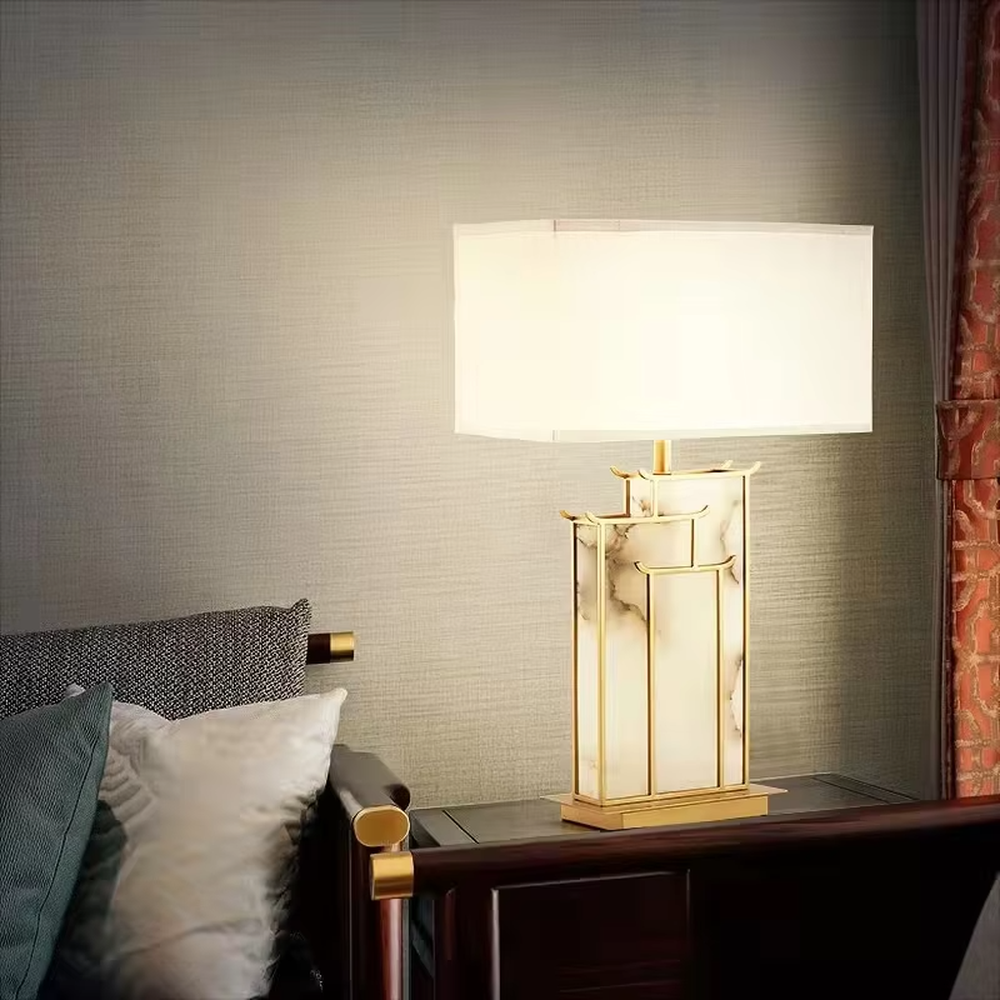 Neo-Chinese style golden frame marble table lamp (linen fabric shade), warm light effect, creating an elegant Chinese-style high-end space atmosphere.