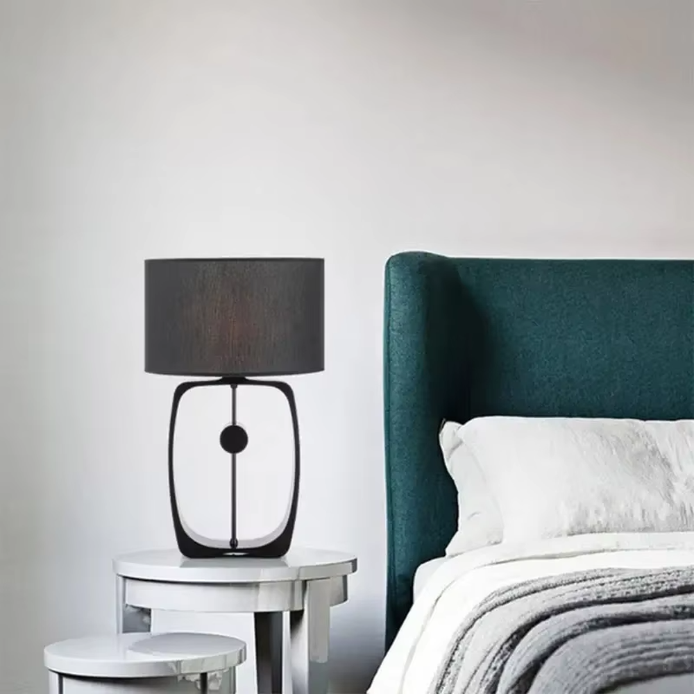 Modern Minimalist Geometric Metal Table Lamp, Black Cylindrical Fabric Lampshade, Hollow Ring Black Metal Lamp Body, Serves Both Lighting and Decorative Purposes, Ideal for Bedrooms, Living Rooms, Studies, Modern Office Spaces, etc.