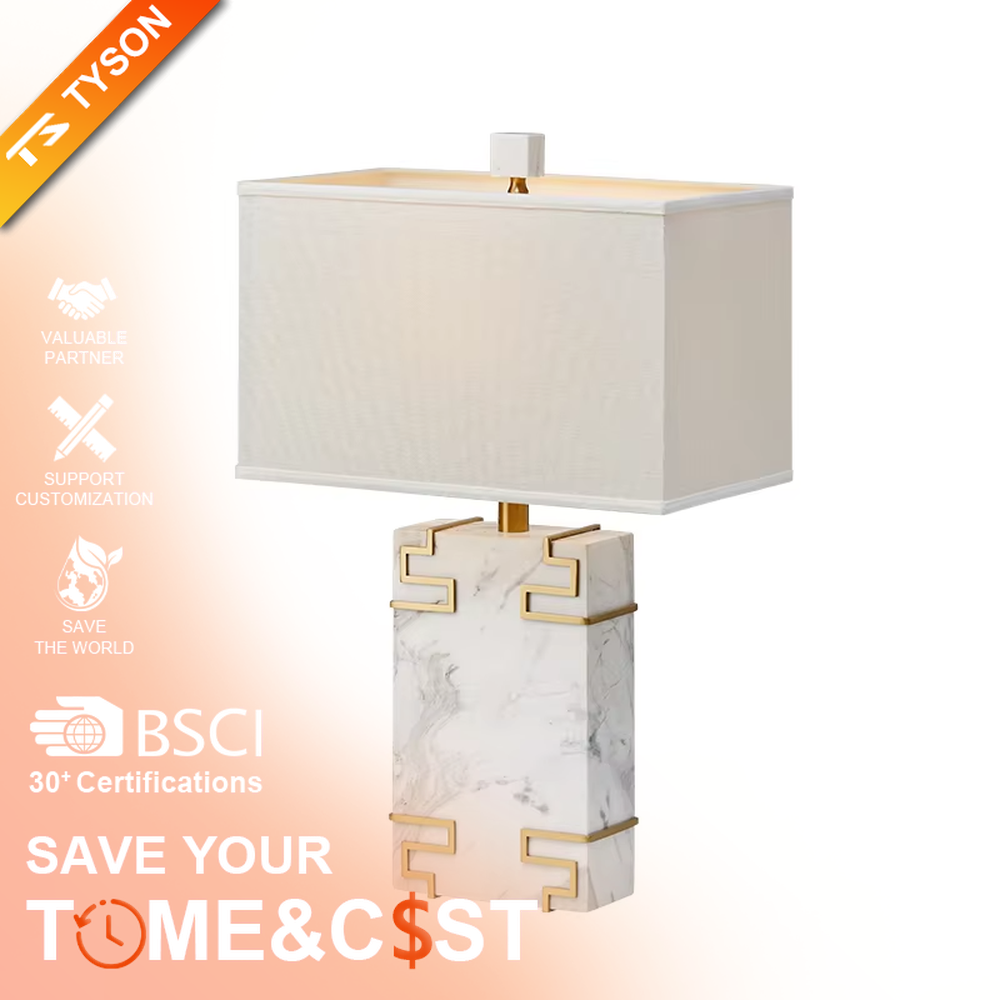 New Chinese light luxury style marble pattern table lamp, with a white faux marble lamp body paired with gold metal fretwork decoration, and a rectangular off-white fabric lampshade. It emits soft and elegant light, combining decorativeness and practicality, suitable for lighting and decoration in spaces such as bedroom nightstands, living room side tables, and New Chinese style show flats.