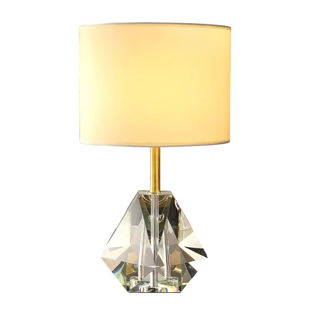 Light luxury multi-faceted cut crystal base table lamp (white shade + gold trim), warm light effect, creating a brilliant and exquisite space atmosphere.