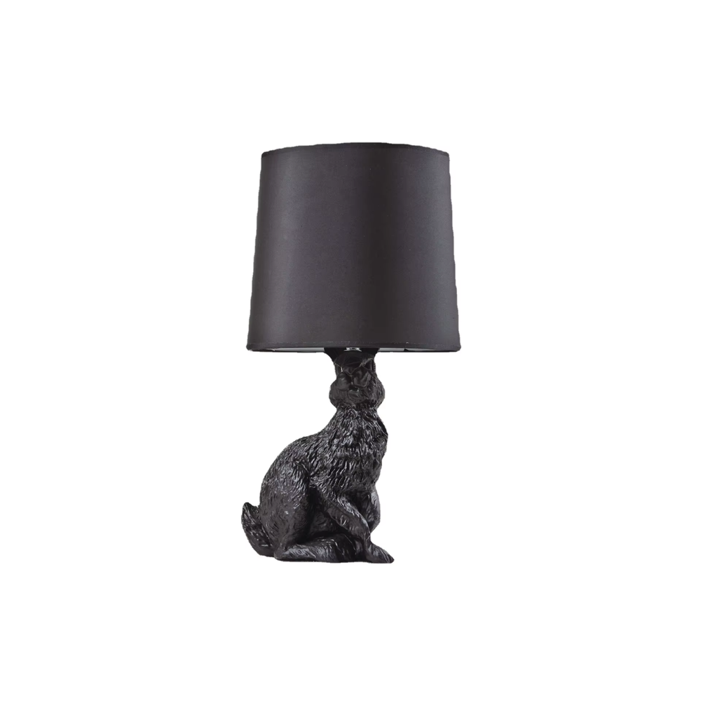 This dark art style table lamp features a bionic rabbit-shaped base made of black resin, paired with a black fabric cylindrical lampshade. The rabbit-lifting-lampshade design is full of fantasy, serving both lighting and decorative purposes, ideal for trendy toy spaces, personalized homes, internet-famous shops and other scenarios.