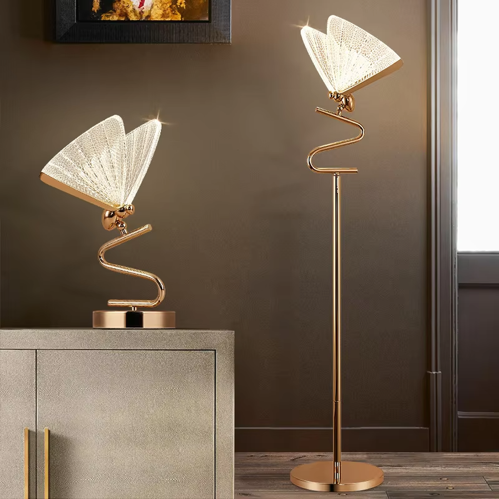 This light luxury modern table lamp features a gold S-shaped metal stand, paired with a ginkgo leaf-shaped textured translucent lampshade, supports angle adjustment, serves both lighting and decorative purposes, ideal for light luxury spaces such as bedroom bedside tables, living room side tables, and hotel guest rooms.