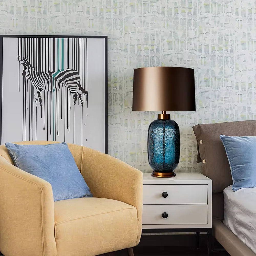 Light luxury cracked blue glaze table lamp (blue glaze body + gradient fabric shade + gold accessories), warm light effect, creating an elegant and high-end home atmosphere.