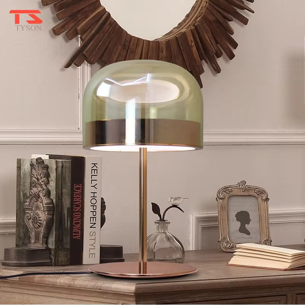 Modern light luxury amber glass dome copper base table lamp, warm light effect, creating an elegant retro space atmosphere.