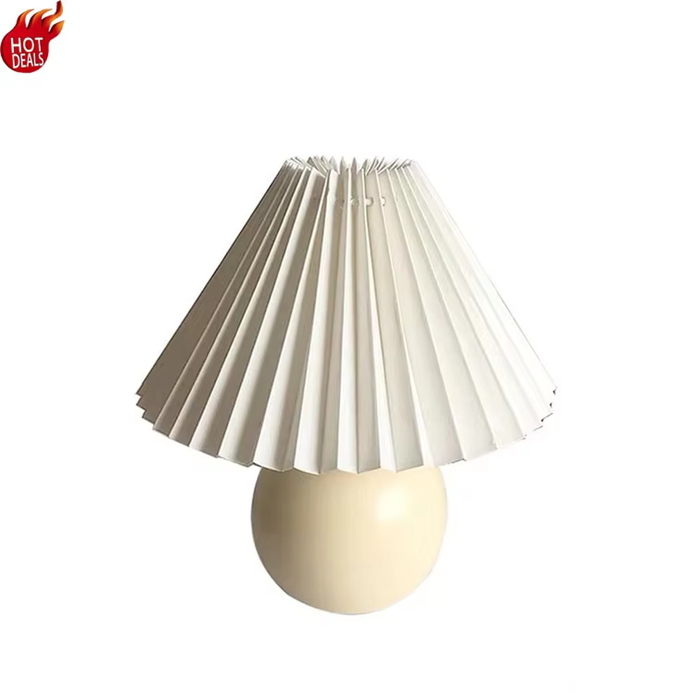 Fresh pleated umbrella shade table lamp (cream yellow glaze ball body + white pleated shade), warm light effect, creating a soft and healing home atmosphere.