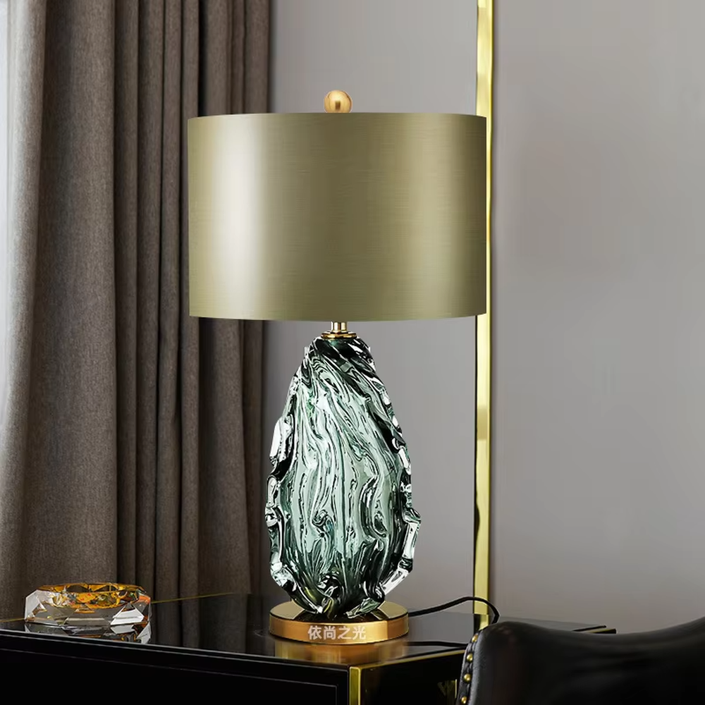 Light luxury textured glass table lamp (dark green glass + metal base), warm light effect, creating an elegant and high-end home space atmosphere.