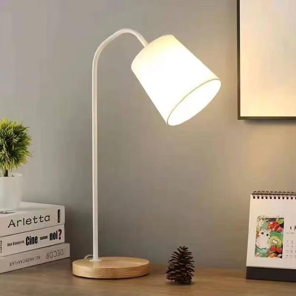 Nordic minimalist eye-protection table lamp, solid wood base paired with white bendable iron lamp pole and fabric lampshade, soft and eye-protective light, used for lighting in desks, nightstands and other areas, suitable for Nordic-style homes, office areas, homestay guest rooms, etc.